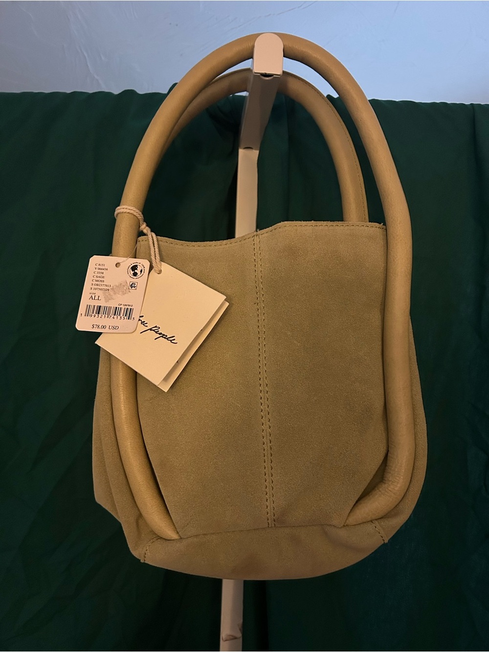 Free People Barlow Suede Bucket Bag in the color
Sage Moss